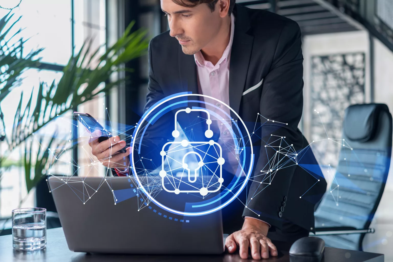 Businessman in suit checking cyber security using smart phone to protect clients confidential information. IT hologram lock icons over modern panoramic office background. Businessman in suit checking cyber security using smart phone to protect clients confidential information. IT hologram lock icons over modern panoramic office background.